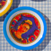 The Frame by Frida Kahlo melamine plate, blue border