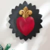 Carved heart fleur de lys on black